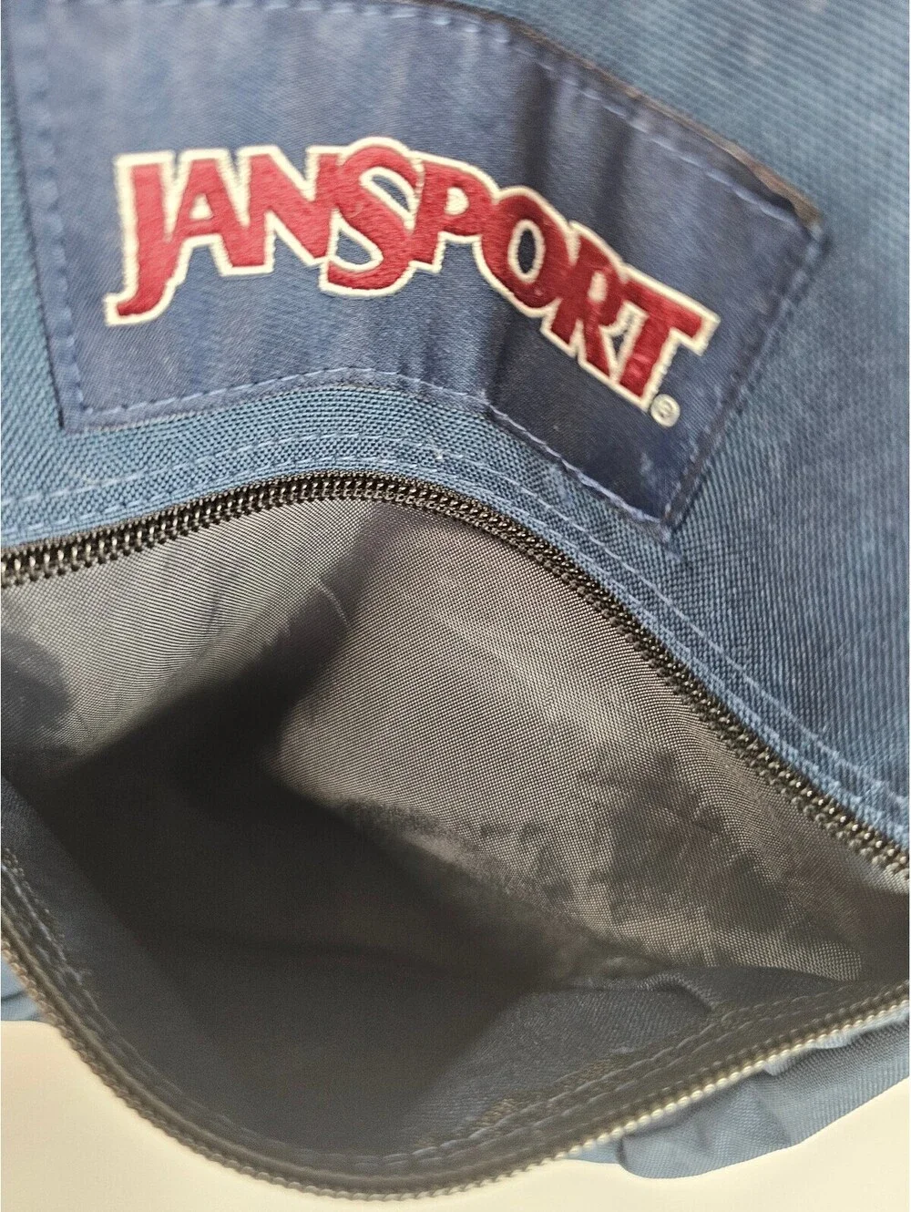 JanSport Classic Navy Blue Backpack with Multiple Compartments